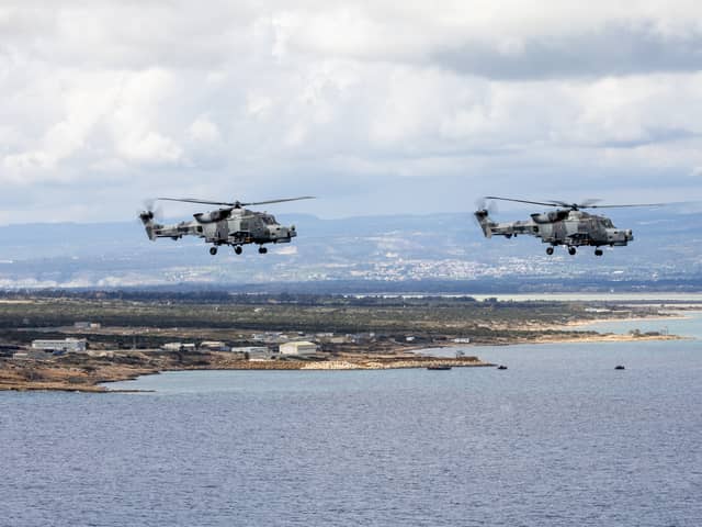 Iran is considering whether UK bases are ‘legitimate targets’ for Iranian ballistic missile strikes. Pictured: Royal Navy 815 Naval Air Squadron Wildcat HMA Mk2 (HMA2) helicopters, armed with Martlet lightweight multirole missiles, flying in a two-ship formation over British Forces Cyprus (BFC).