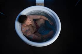 Waterlooville dad Harry Beattie in an ice bath - a daily routine which he says has aided his recovery from addiction.
