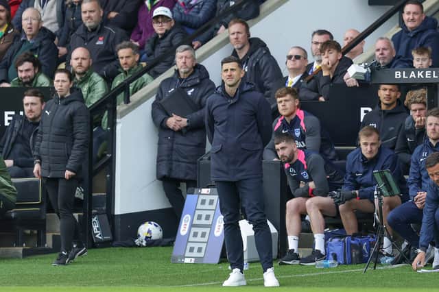 Pompey boss John Mousinho was delighted with a late point at Norwich. Picture: Jez Tighe/ProSportsImages