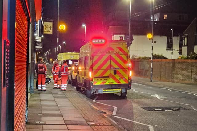 Ambulance crews on Highland Road on Friday, April 3.