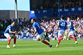 Pompey celebrate their 88th-minute equaliser in the 2-2 draw with Oxford. Picture: Graham Hunt/ProSportsImages