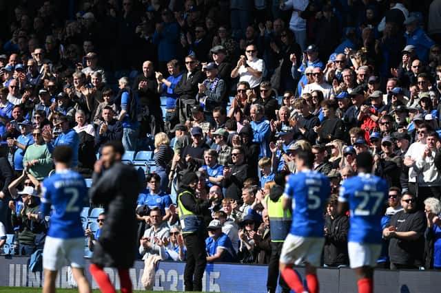 The Fratton faithful show their appreciation to Pompey's players following a hard-fought 2-2 draw with Oxford United. Picture: Graham Hunt/ProSportsImages