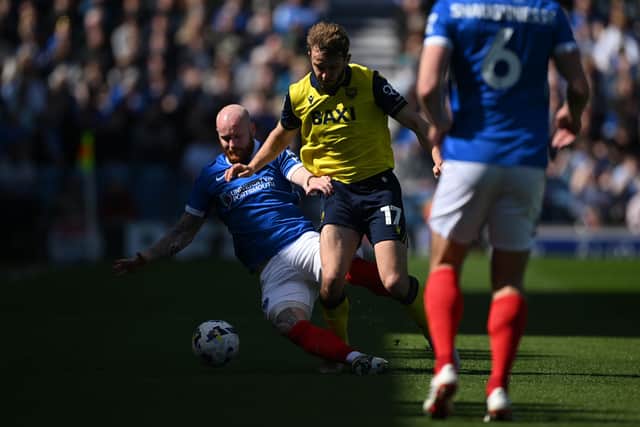 Connor Ogilvie was sent off against Oxford United for a challenge on Stan Mills.