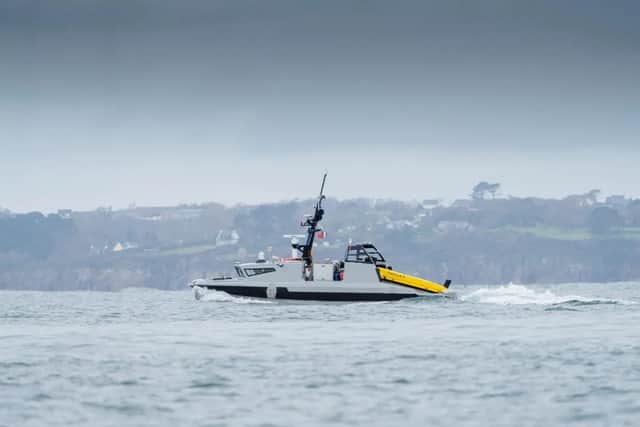 The Royal Navy has been handed a new autonomous mine-hunting ship amid talks to reopen the Strait of Hormuz, currently being blockaded by Iran.