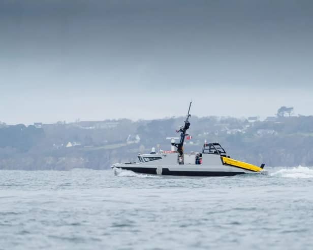 The Royal Navy has been handed a new autonomous mine-hunting ship amid talks to reopen the Strait of Hormuz, currently being blockaded by Iran.