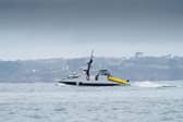 The Royal Navy has been handed a new autonomous mine-hunting ship amid talks to reopen the Strait of Hormuz, currently being blockaded by Iran.