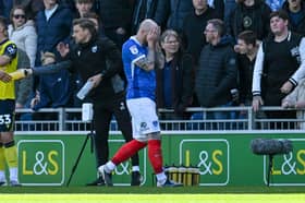 Connor Ogilvie looks dejected after his Oxford United red card. Picture: Graham Hunt/ProSportsImages