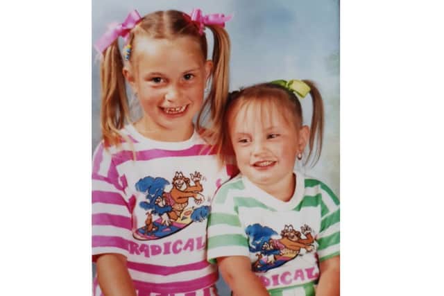 Tamsyn (left) with sister Rox-Anne Collier-Baker (right) when they were children.