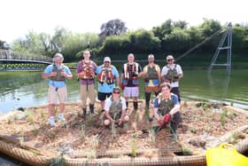 The team behind the project with Southern Water and Portsmouth University. Dr Ian Hendy, left, the Biomatrix team and Pioneer Habitats on the floating saltmarsh wetland in Hilsea