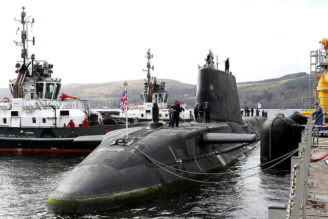 An apprentice has been injured and rushed to hospital following an incident working on HMS Audacious in Plymouth. Pictured is the nuclear attack submarine in Clyde, Scotland, in 2020.