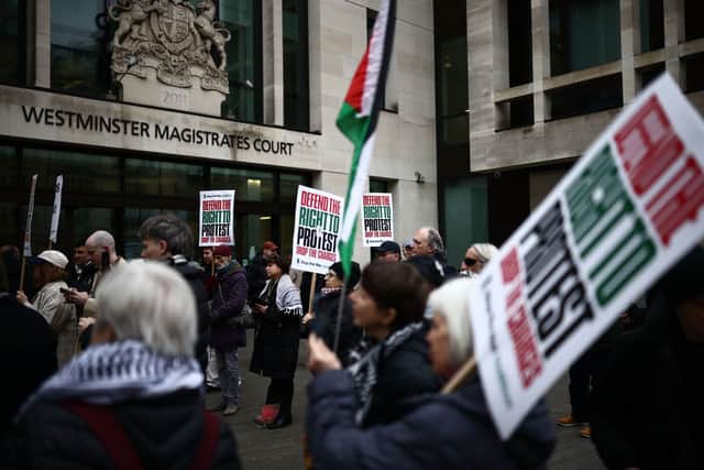 Ministers have hit back at pro-Palestine protestors who heckled Royal Navy officers and called them "baby butchers". Pictured: A pro-Palestine march, outside Westminster Magistrates' Court in London on April 01, 2026.