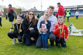 Warrant Officer 1 Stuart More has gone on deployment with HMS Prince of Wales, leaving his wife, Chief Petty officer Katie More, to look after the children. He is a trustee of Little Troopers, a charity that supports military children. Pictured: The Moore family