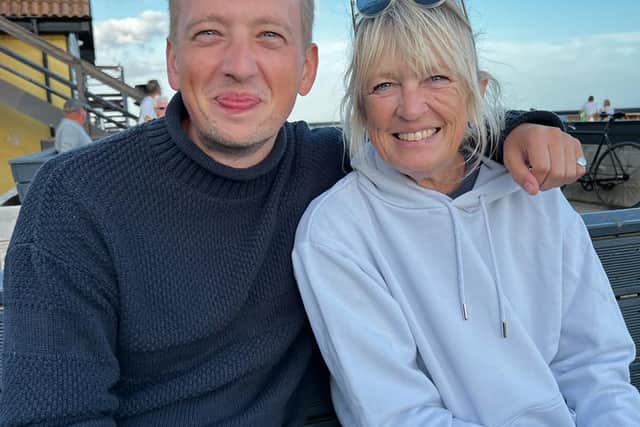 Pictured: Jake with his mum Sara