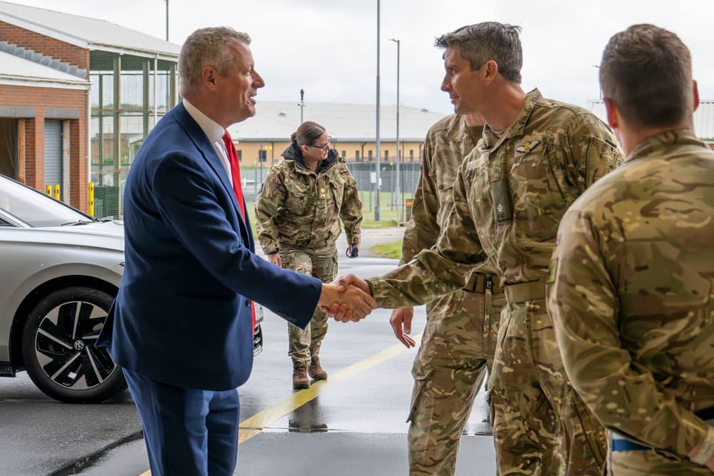 A £879m maintenance contract has secured hundreds of jobs in Gosport working on Apache and Chinook helicopters. Pictured: Defence minister Luke Pollard at the Army Aviation Centre.