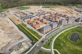 New homes - with the beginnings of the community orchard on the left hand side