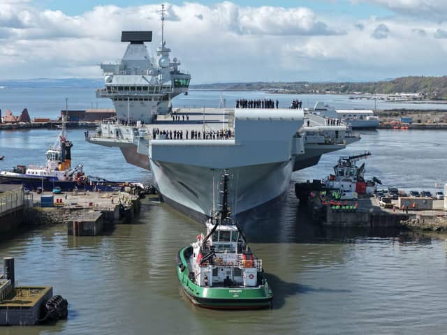 HMS Queen Elizabeth has left the Rosyth dry dock after several months on the side-lines. She is current at anchor near the Fort bridges in Scotland.