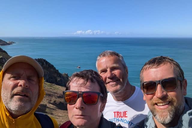 The team from South North Adventure, who were towed into Weymouth after coming into difficulty rowing across the Solent.