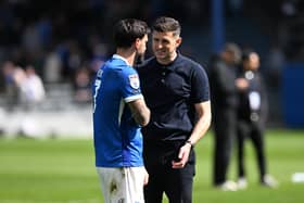 Pompey boss John Mousinho and skipper Marlon Pack.