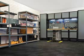 A complete BiGDUG garage setup showing how shelving, cabinets and a workbench can transform a cluttered space into a practical workshop