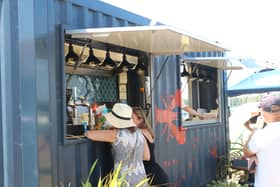 Guests ordering food and drink from the Lobster Hatch