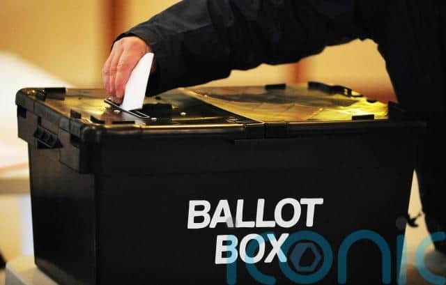 You fold your ballot paper in half and drop it into the ballot box. If you make a mistake you can get a new ballot paper from the staff, but only if you have not put your ballot in the box yet.