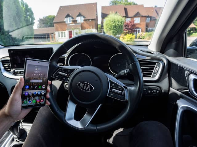More than 70,000 motorists were fined for using their mobiles at the wheel over the last three years