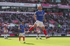 Adrian Segecic celebrates his Stoke City hat-trick for Pompey. Pic: Alun Roberts/ProSportsImages