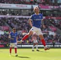 Adrian Segecic celebrates his Stoke City hat-trick for Pompey. Pic: Alun Roberts/ProSportsImages
