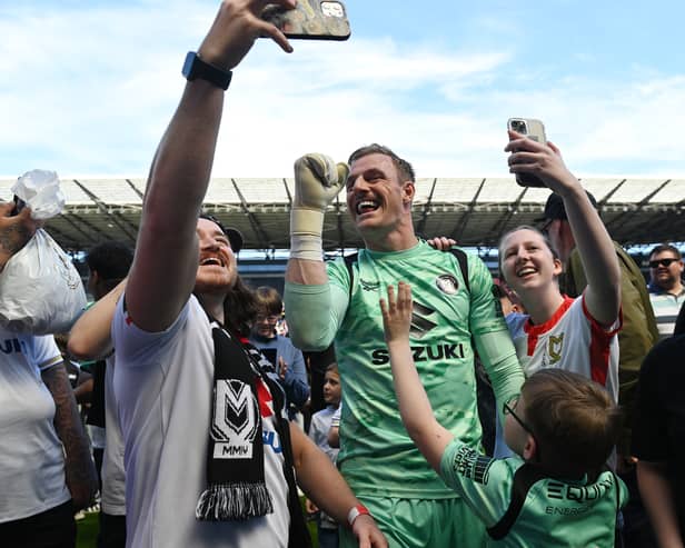 Former Pompey man Craig MacGillivray has won promotion from League Two with MK Dons.