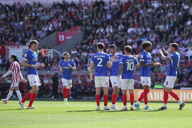Pompey celebrate Adrian Segecic’s first-half opener at Stoke. Picture: Alun Roberts/ProSportsImages