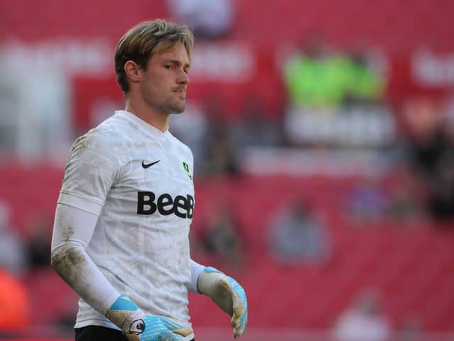 Josef Bursik's Pompey return lasted for four minutes, before he was forced off with a quad injury. Picture: Alun Roberts/ProSportsImages