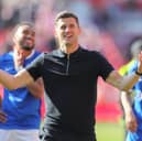 Pompey boss John Mousinho. Pic: Alun Roberts/ProSportsImages