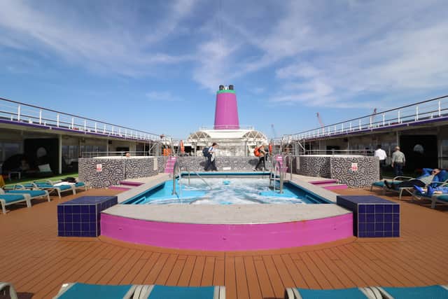 Pictured: Top deck of MS Ambition with a swimming pool.