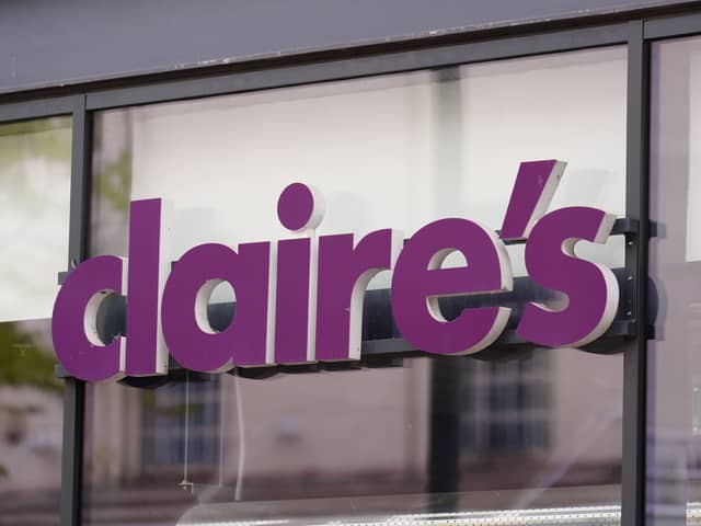 The Claire's logo above a shop doorway