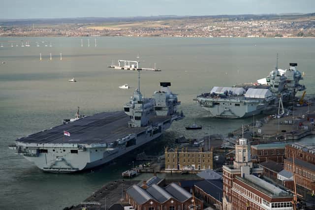 The Royal Navy’s two aircraft carriers, HMS Queen Elizabeth and HMS Prince of Wales alongside in Portsmouth earlier this year