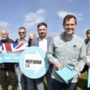 Reform UK's Robert Jenrick visited Havant, Waterlooville and Portsmouth on Tuesday, April 28, 2026. Pictured is: (second from right) Robert Jenrick with supporters in Milk Lane, Waterlooville, holding their new leaflet dispenser. 
Picture: Sarah Standing (280426-526)
