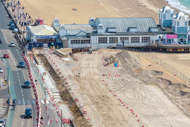 New sea defences next to South Parade Pier in Southsea, with the new concreate units being installed between the promenade and the beach