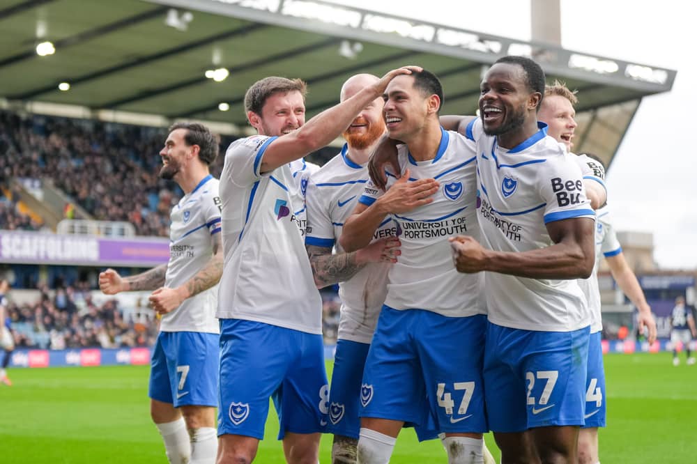 Gustavo Caballero, centre, is congratulated for his goal against Millwall last season.
