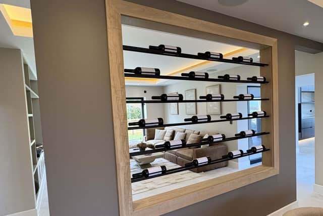 It even has its own wine wall