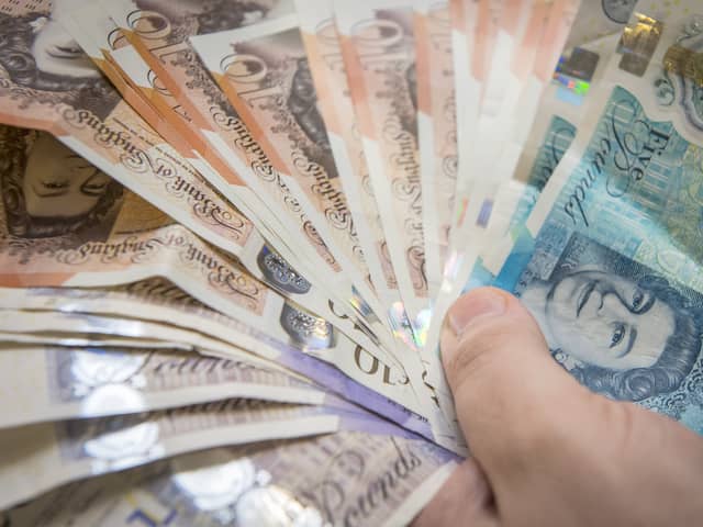 stock pic money cash notes pay