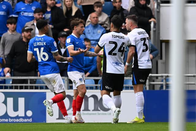 Adrian Segecic is confronted by two Birmingham players