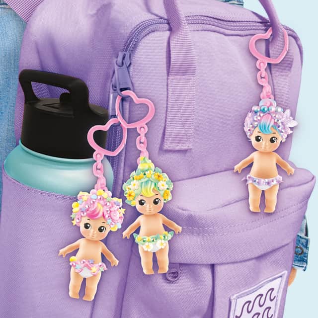 Each comes with an attached keychain, allowing it to be clipped onto bags, keys, or clothing.