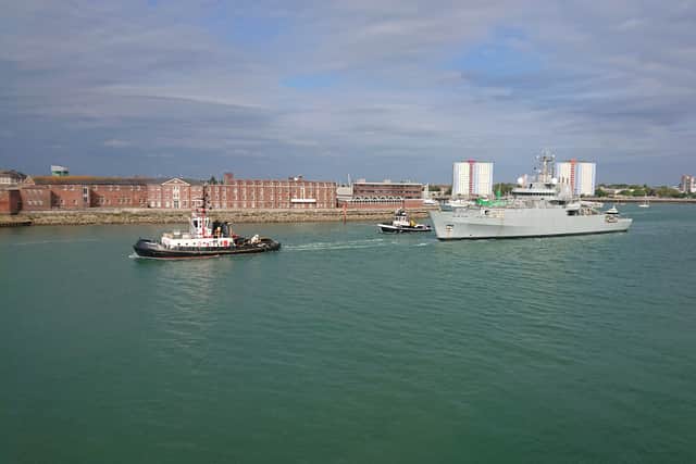 Retired Royal Navy survey ship HMS Enterprise being towed out of HMNB Portsmouth for the final time. She is set to be transformed ahead of being transported to Bangladesh.