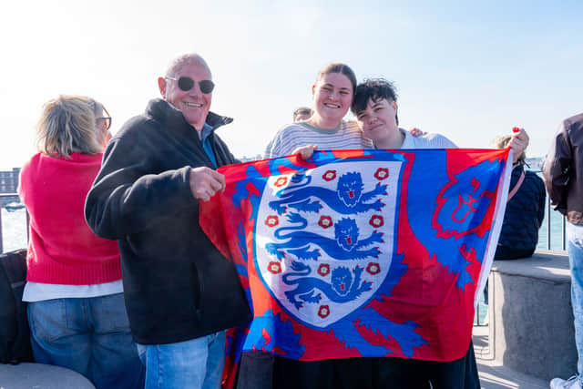 Richard Harvey waiting for his son WO1 Robert Harvey. He is joined by his granddaughter, Elizabeth Harvey, and Rachel Dillon