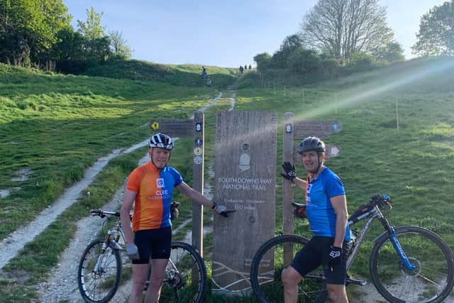 Mark (left) cycled 160km with friends and family in aid of Cure Parkinson's