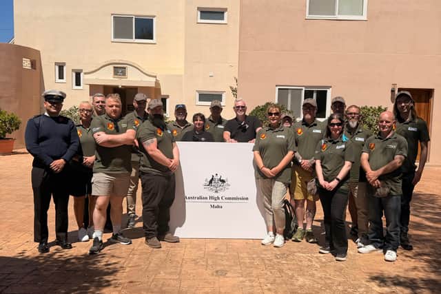 Veterans in Malta with the British High Commissioner, providing 900 hours of work to restore historic sites.
