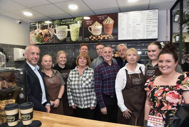 Pictured is: The Parsons family and staff who own and run Coffee Cup.
Picture: Sarah Standing (120526-1694)