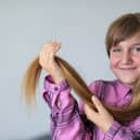 Lily-Mae Barnes, 13, of Havant, will have her first ever haircut in the summer holidays. She is donating it to the Little Princess Trust and at the same time, raising awareness awareness of kidney charities 
Picture: Chris Moorhouse (090526-22)

