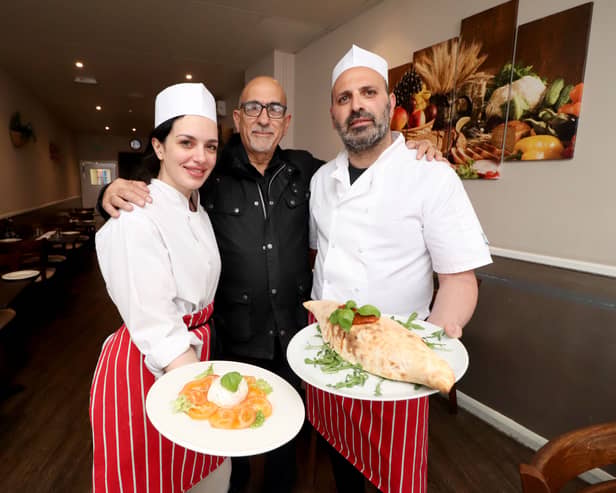Bella Calabria in North End, Portsmouth. 

Pictured: Manager Giovanni Vaccaro (centre) with staff Marika Di Bari and head chef and owner Seby Fortuna. 

Picture: Habibur Rahman