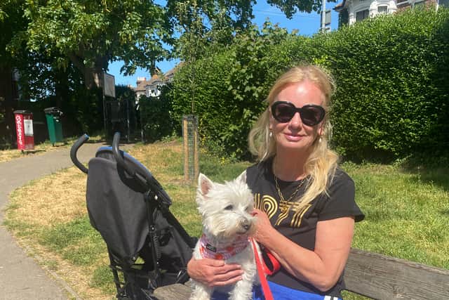 Lori Boswell with her dog Coco at Wimbledon Park